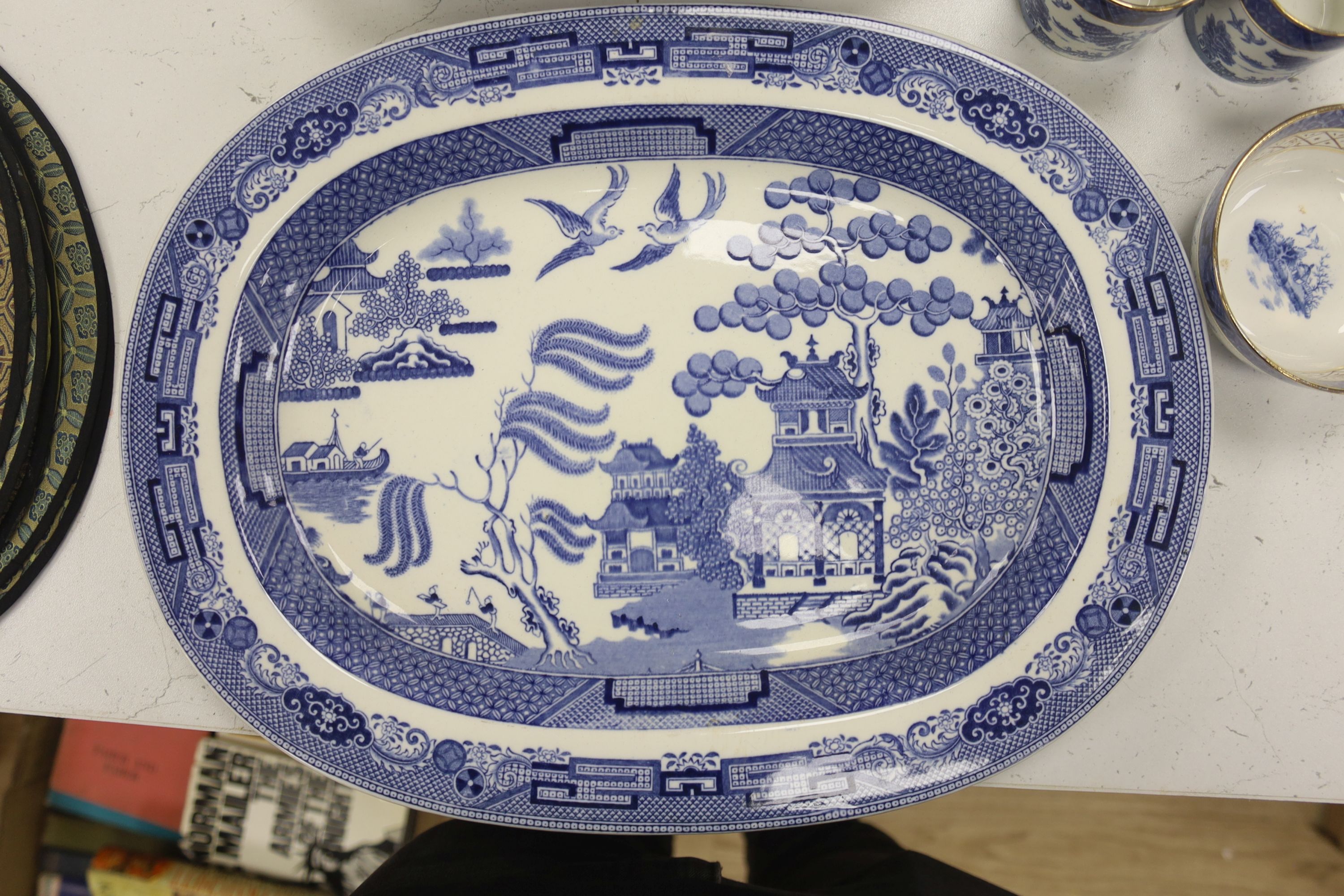 A Wedgwood blue and white willow pattern meat dish, a Copeland Spode Tower pattern square shaped bowl & a blue and white coffee pot (3)